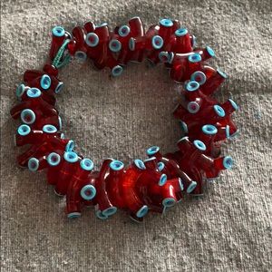 Handmade blown glass coral necklace .